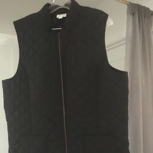 Black quilted vest.